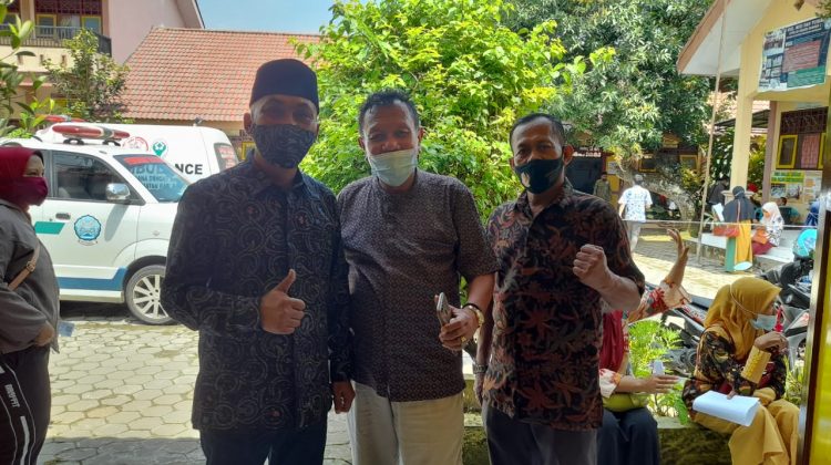 Kiri Bambang Budi Mistika Kepala Dinas Pendidikan Kabupaten Bangkalan. (Foto : killu.net / ist)